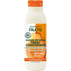 Garnier Fructis Après-Shampooing réparateur dommages papaye extrait: cheveux doux et brillants.