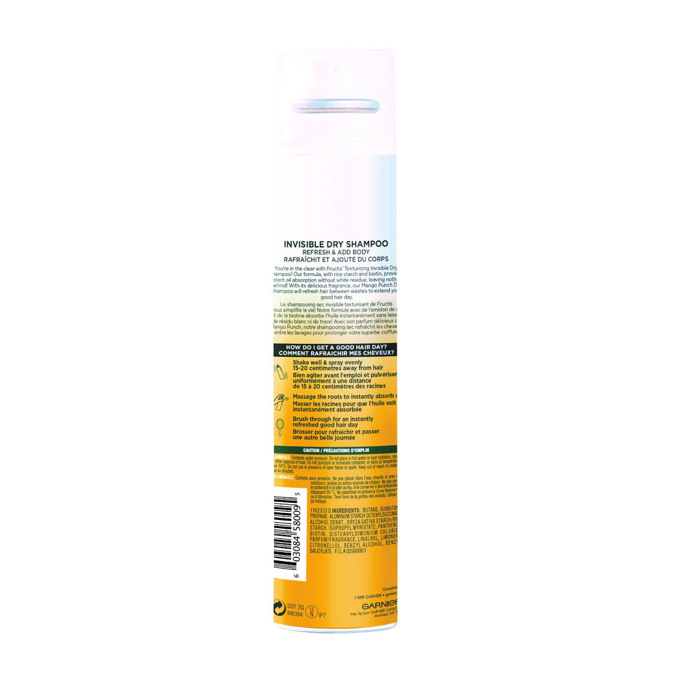Garnier Fructis Mango Punch – brossage après application pour cheveux nets et volumisés.