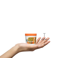 Après utilisation, cheveux plus doux et plus lumineux avec le masque Papaye Garnier Fructis