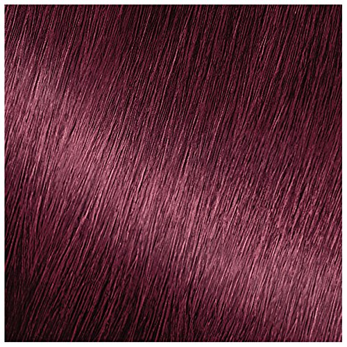 Après-coloration Garnier Nutrisse, conditionneur enrichi huiles avocat olive karité pour cheveux soyeux.