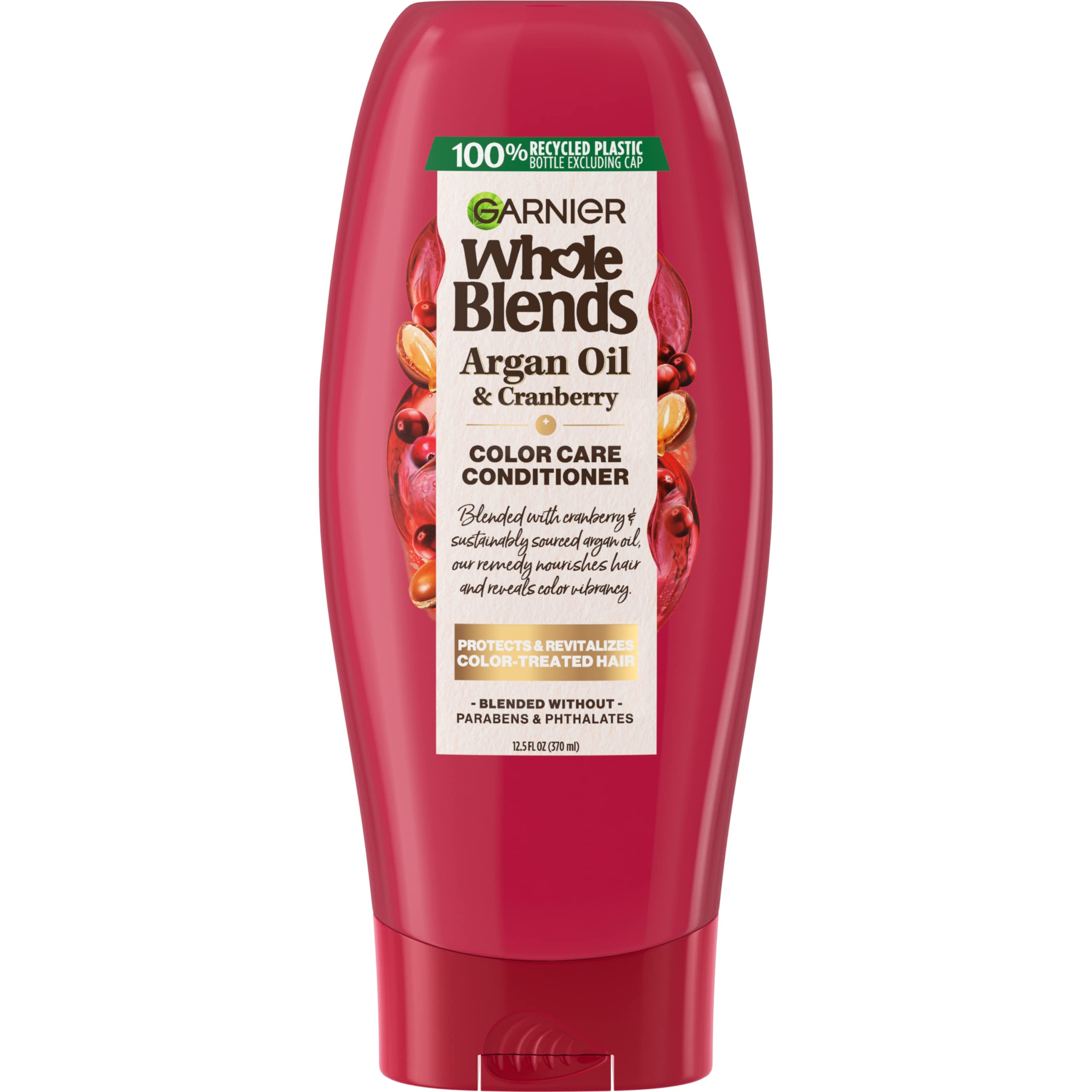 Flacon Garnier Whole Blends Color Care Conditioner avec huile d’argan et canneberge, hydratation et couleur protégée.