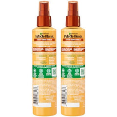 Flacon Hair Honey Milk prêt à l’application sur cheveux humides.