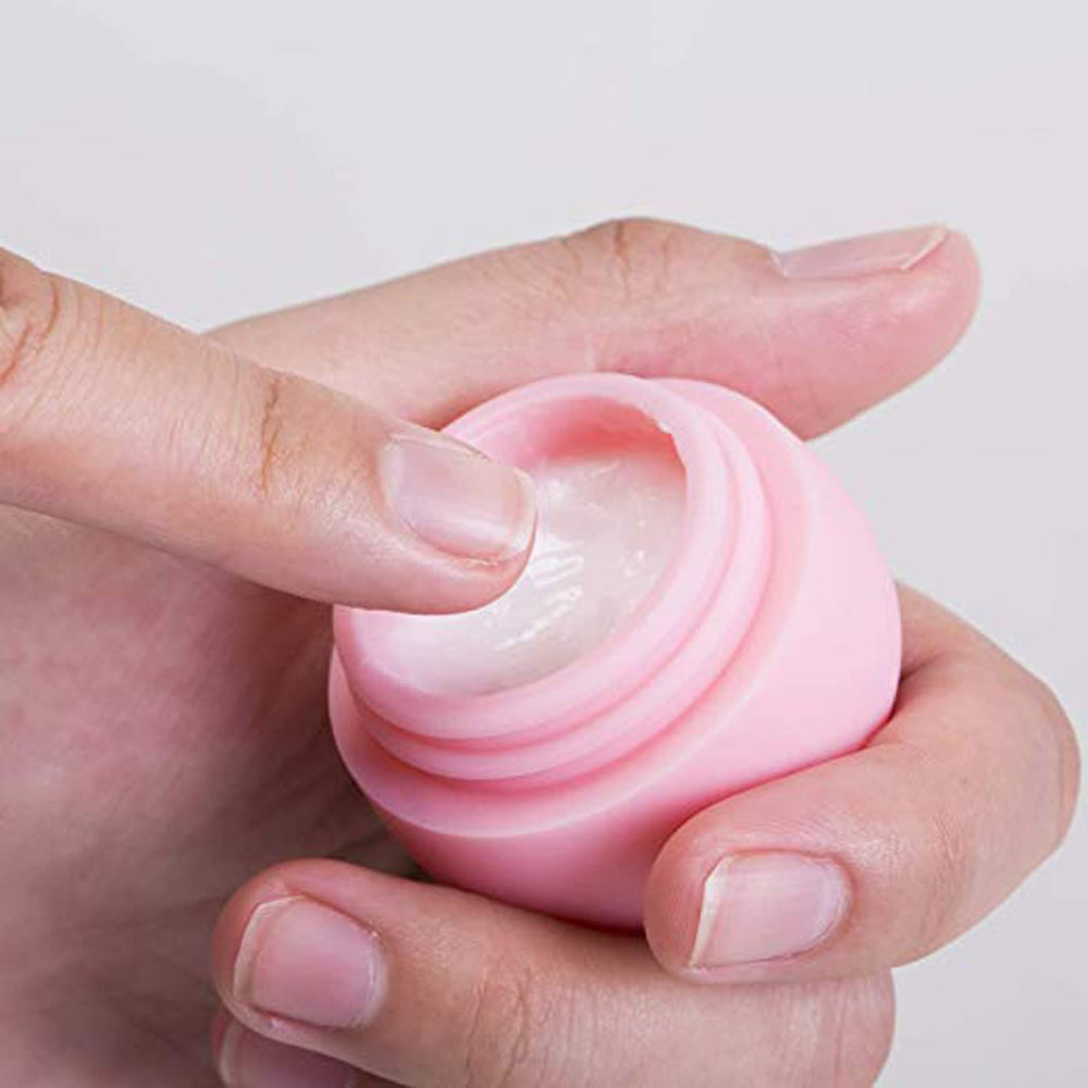Gemice crème silicone flacon jaune, bouchon réversible pour une utilisation simple.