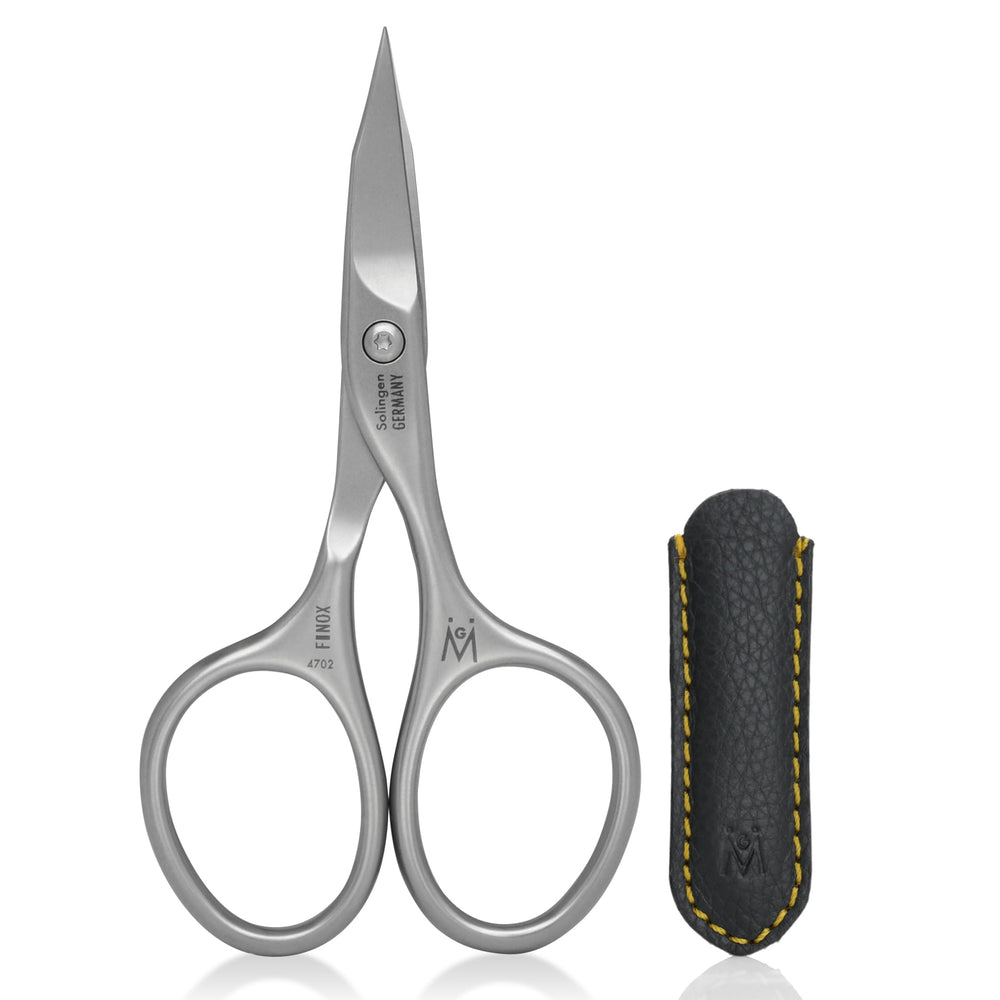 Ciseaux GERManikure incurvés pour ongles, précision et douceur.