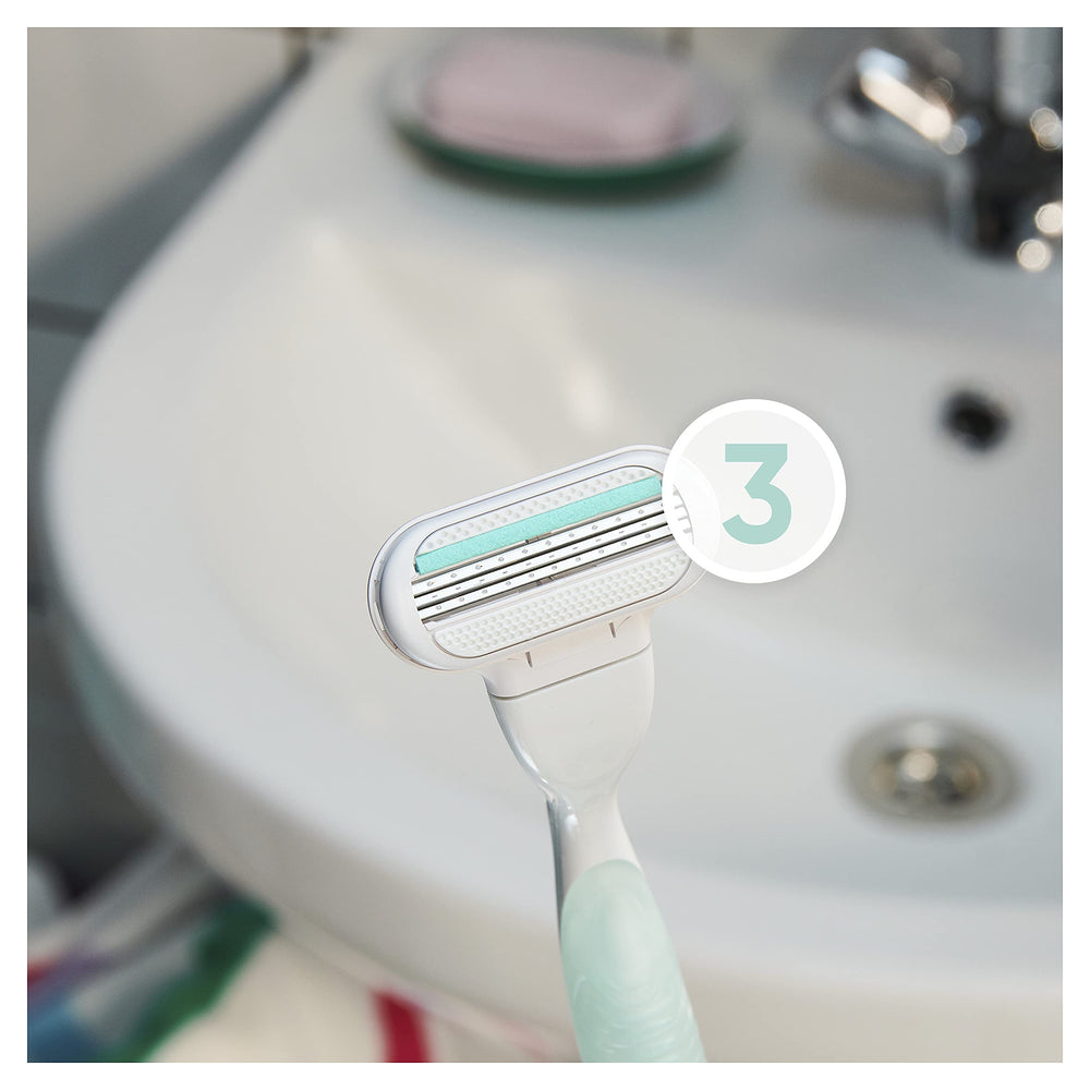 Design simple et pratique pour un rasage fluide avec Venus Smooth Sensitive.