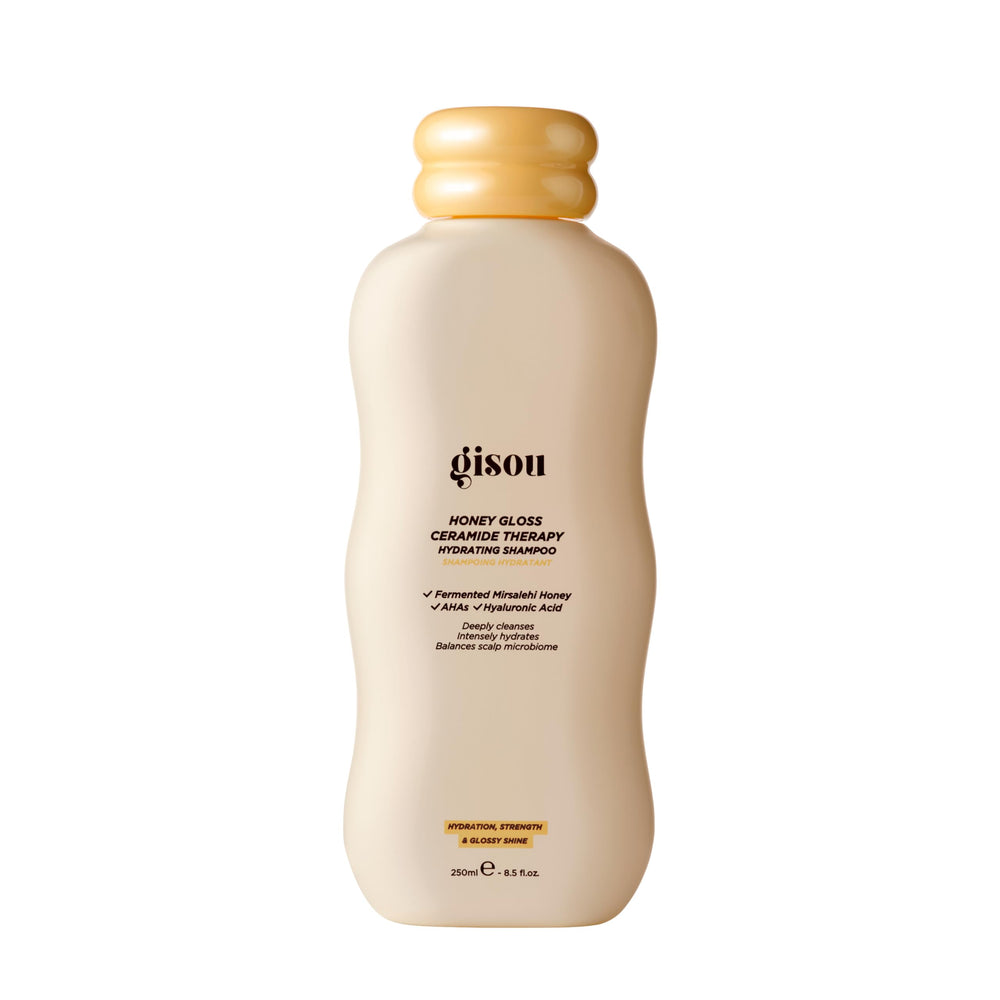 Gisou Honey Gloss Ceramide Therapy Shampoo - Bouteille chic et hydratante pour cheveux propres.