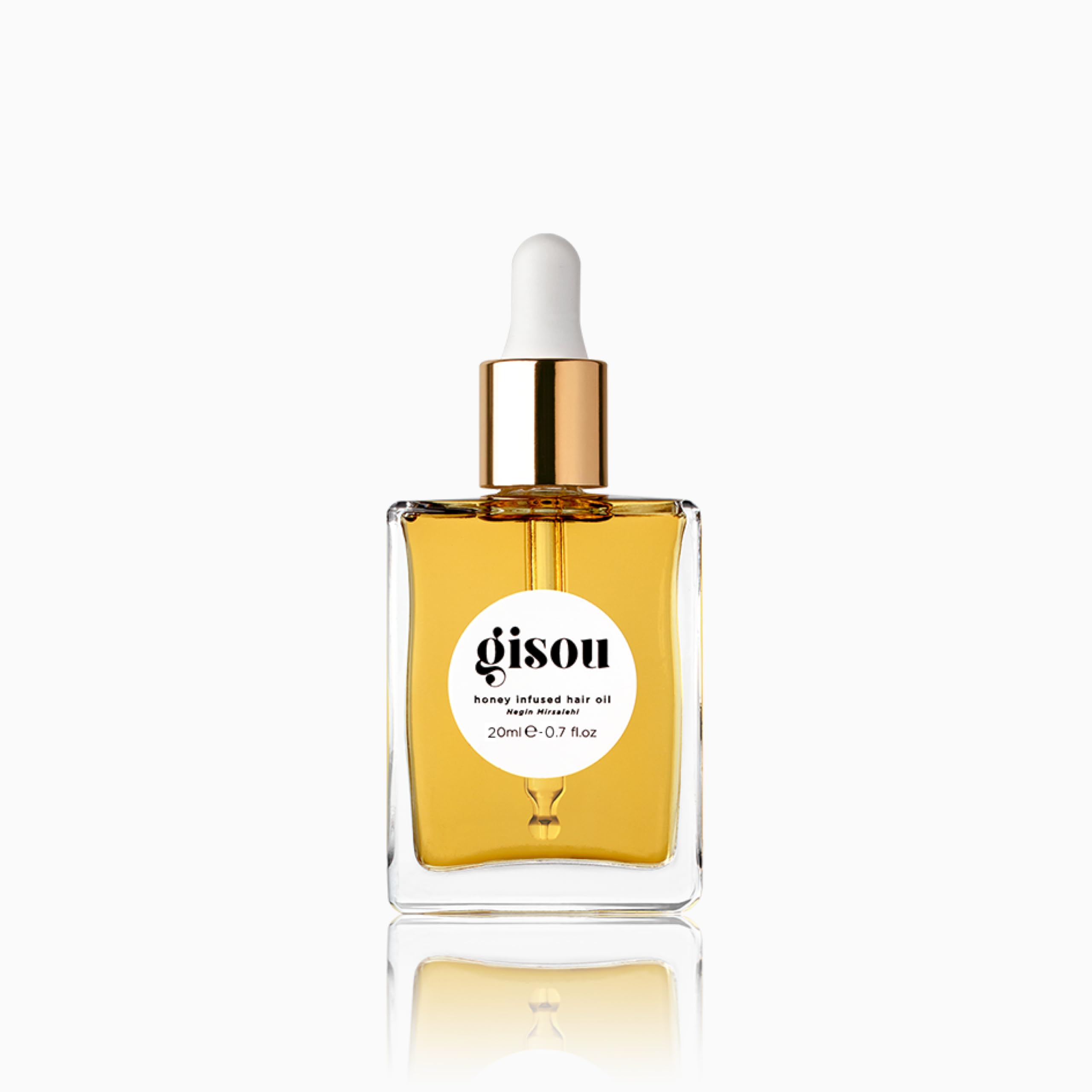 Gisou Huile Infusée au Miel Mini — bouteille élégante prête à hydrater et briller les cheveux