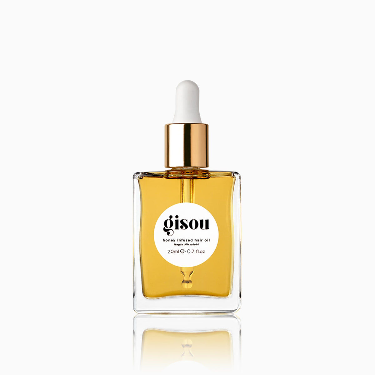 Gisou Huile Infusée au Miel Mini — bouteille élégante prête à hydrater et briller les cheveux