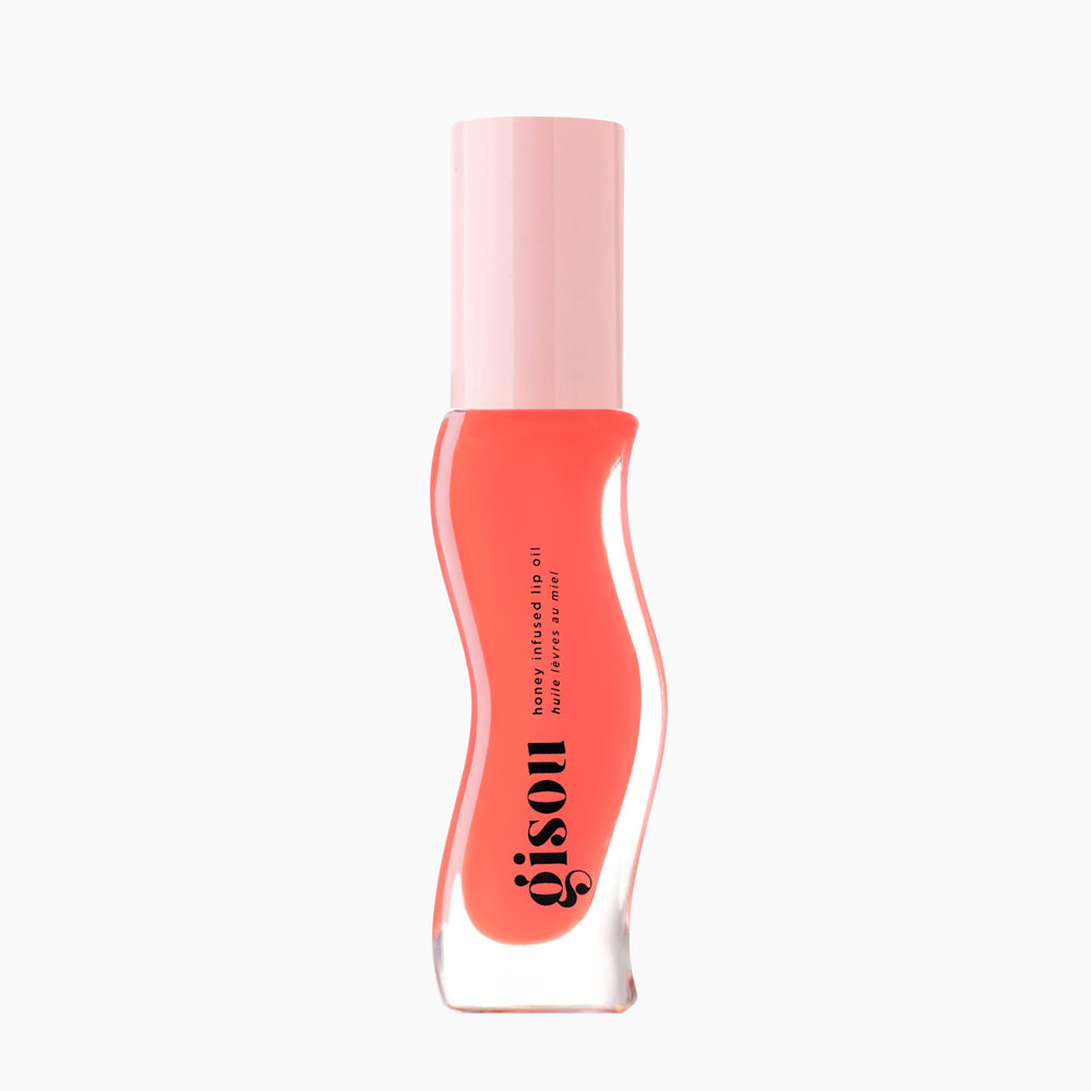 Gisou huile lèvres infusée au miel, bouteille élégante pour hydratation durable.