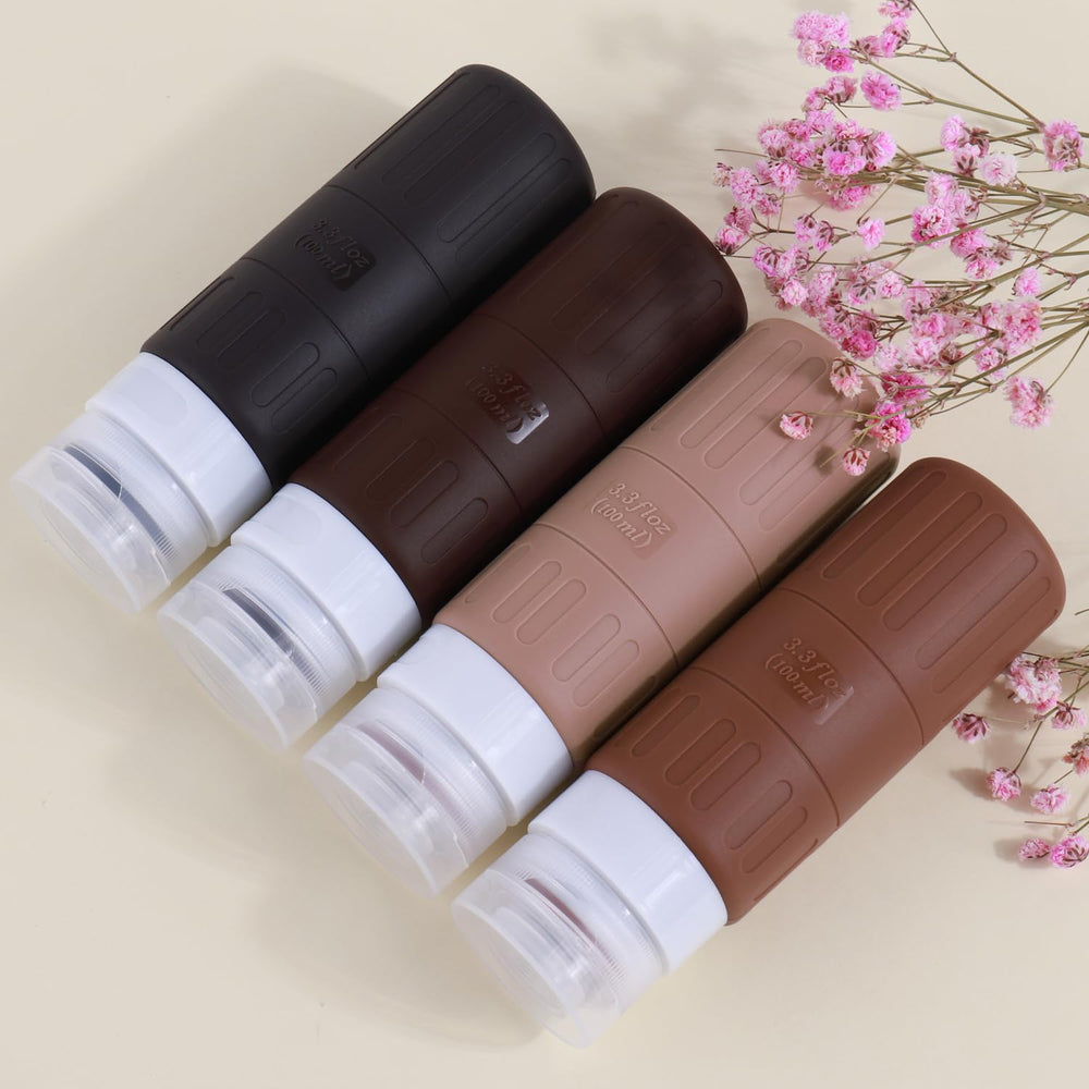 GLAMFIELDS Bouteille presse voyage, ouverture facile et remplissage rapide pour les liquides.