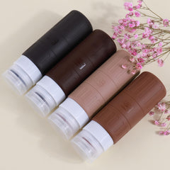 GLAMFIELDS Bouteille presse voyage, ouverture facile et remplissage rapide pour les liquides.
