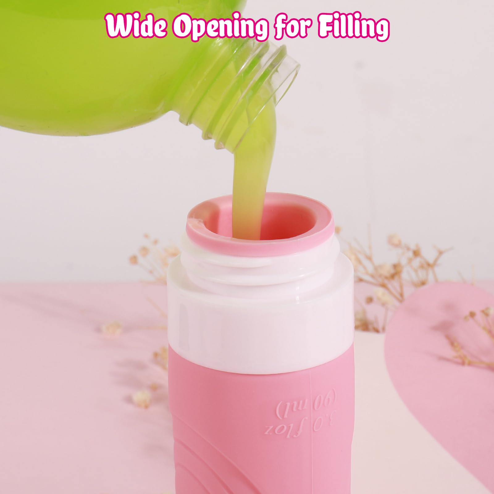 GLAMFIELDS bouteille silicone douce rose, facile à presser et réutilisable.