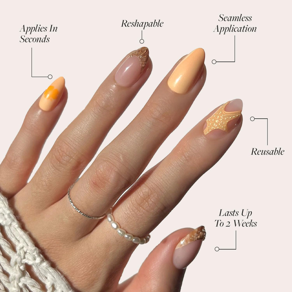 Glamnetic 3D starfish accent nails add tactile seashell detail for coastal vibes.