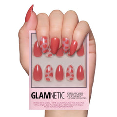 Glamnetic Love Me nails with semi-transparent red hearts for date nights.