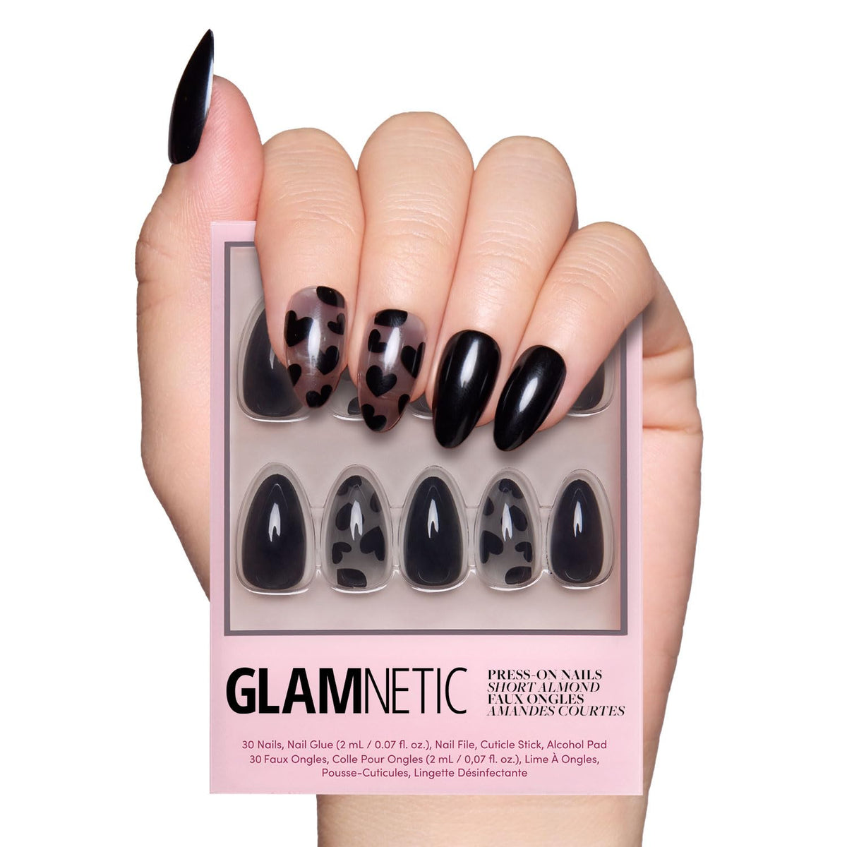 Glamnetic Love Me Not opaque nails with bold black hearts for edgy Valentine style.