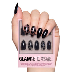 Glamnetic Love Me Not opaque nails with bold black hearts for edgy Valentine style.