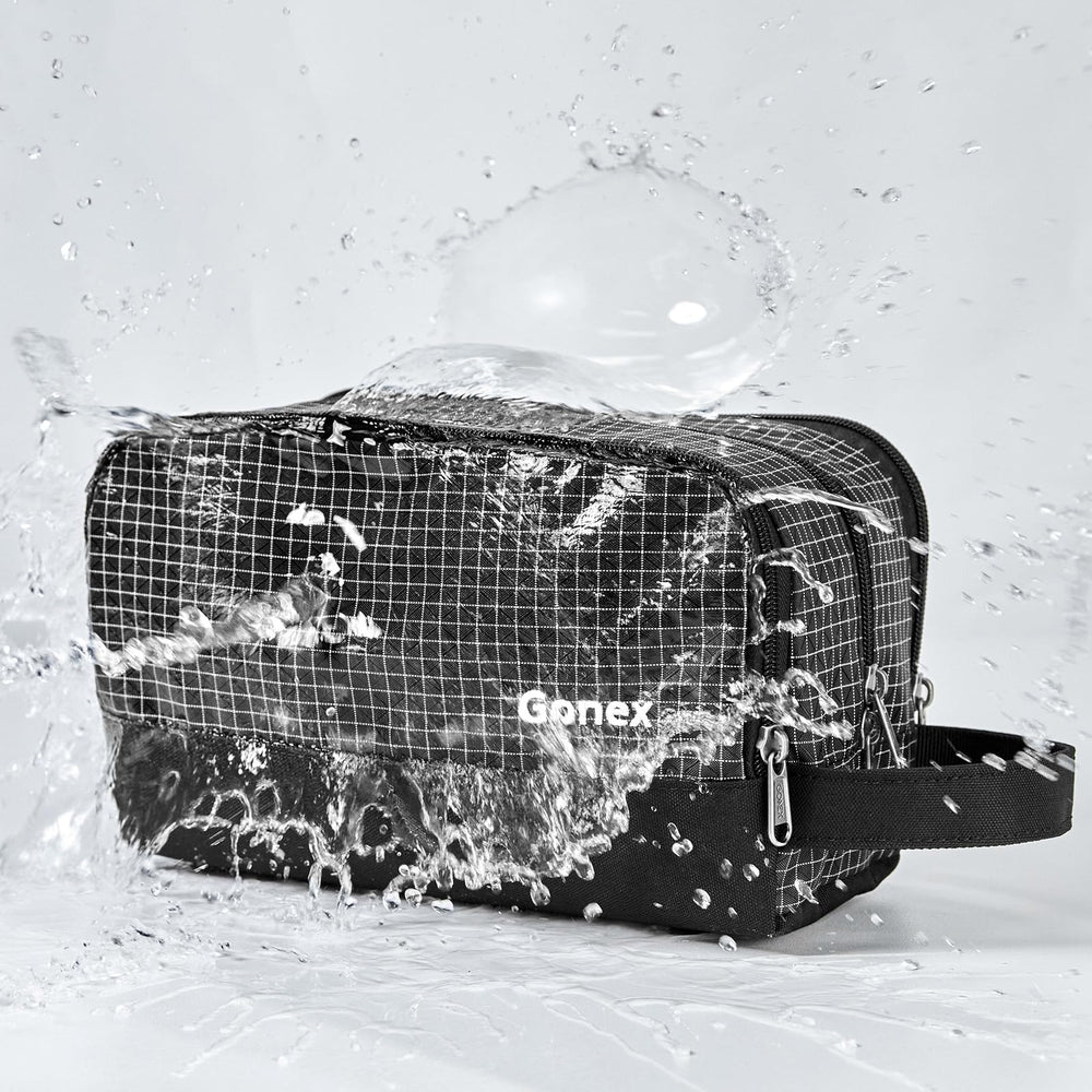 Gonex sac de toilette noir intérieur bien organisé pour faciliter le rangement.