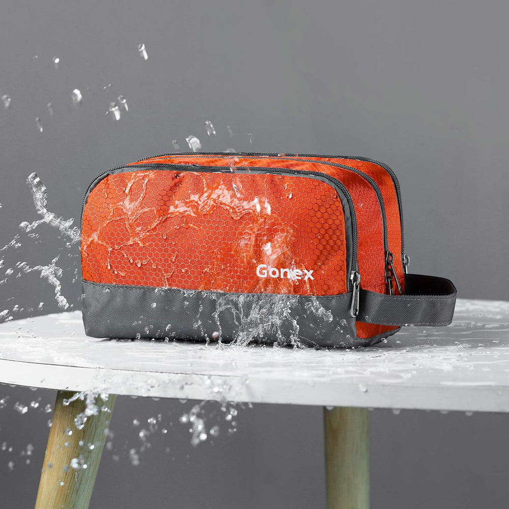 Gonex sac toilette voyage en nylon orange – pochette maille zippée pour petits articles.