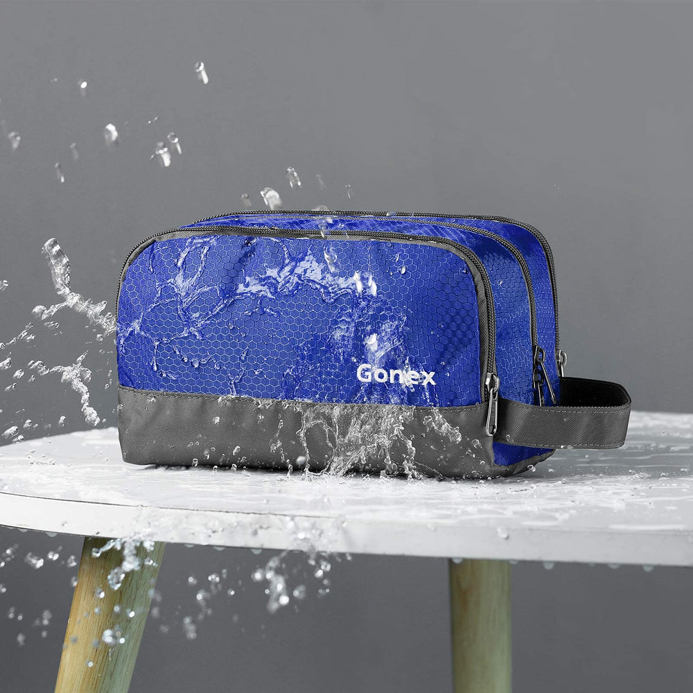 Gonex trousse bleu ouverte, montre les compartiments principaux et la poche filet.