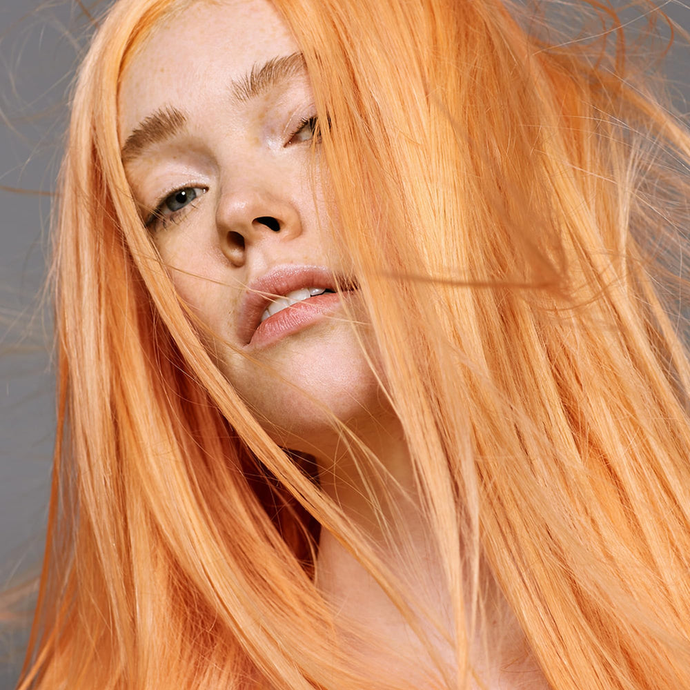 Good Dye Young peche-orange, texture creme riche pour une couleur vibrante sans abîmer les cheveux.