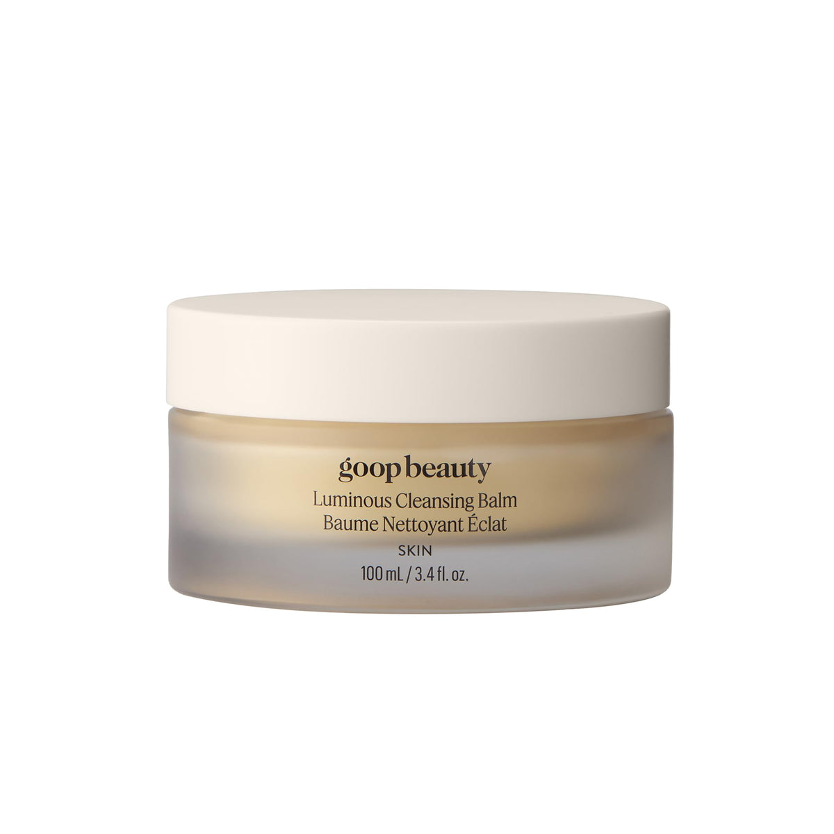 Goop Cleansing Balm fond sur le visage et démaquille maquillage et écran solaire en douceur.