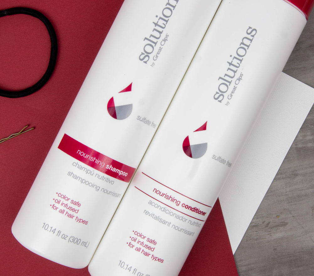 GREAT CLIPS Solutions Nourishing Shampoo color-safe bottle showcases lasting shine and moisture