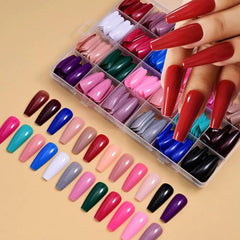 GUFUGU finition brillante sur ongles acyliques pour un look lumineux.