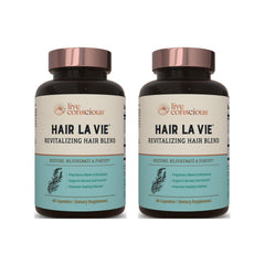 Hair La Vie Live Conscious: bouteille visible, soutien potentiel à la croissance des cheveux.