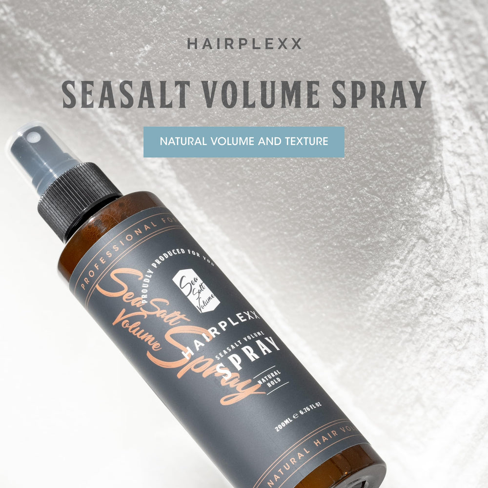 Lifestyle shot of a person applying Hairplexx Sea Salt Volume outdoors.