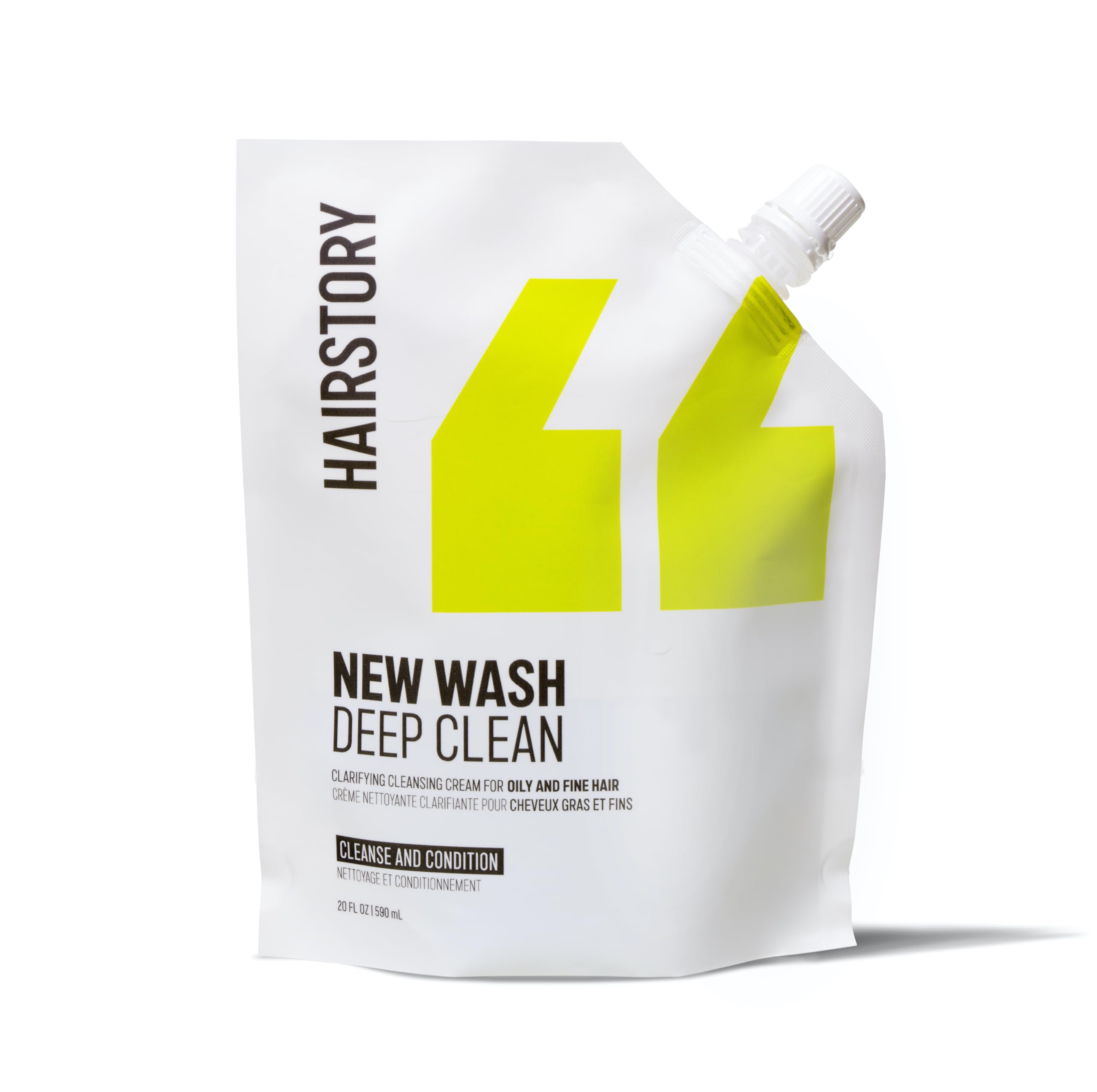 Flacon Hairstory New Wash en remplissage, pratique et facile à réapprovisionner.