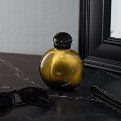 Halston 1-12 packaging detail close-up with premium finish