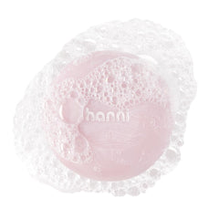 HANNI Cocoon Cleanse Serum, bouteille montrant texture hydratante pour le corps.