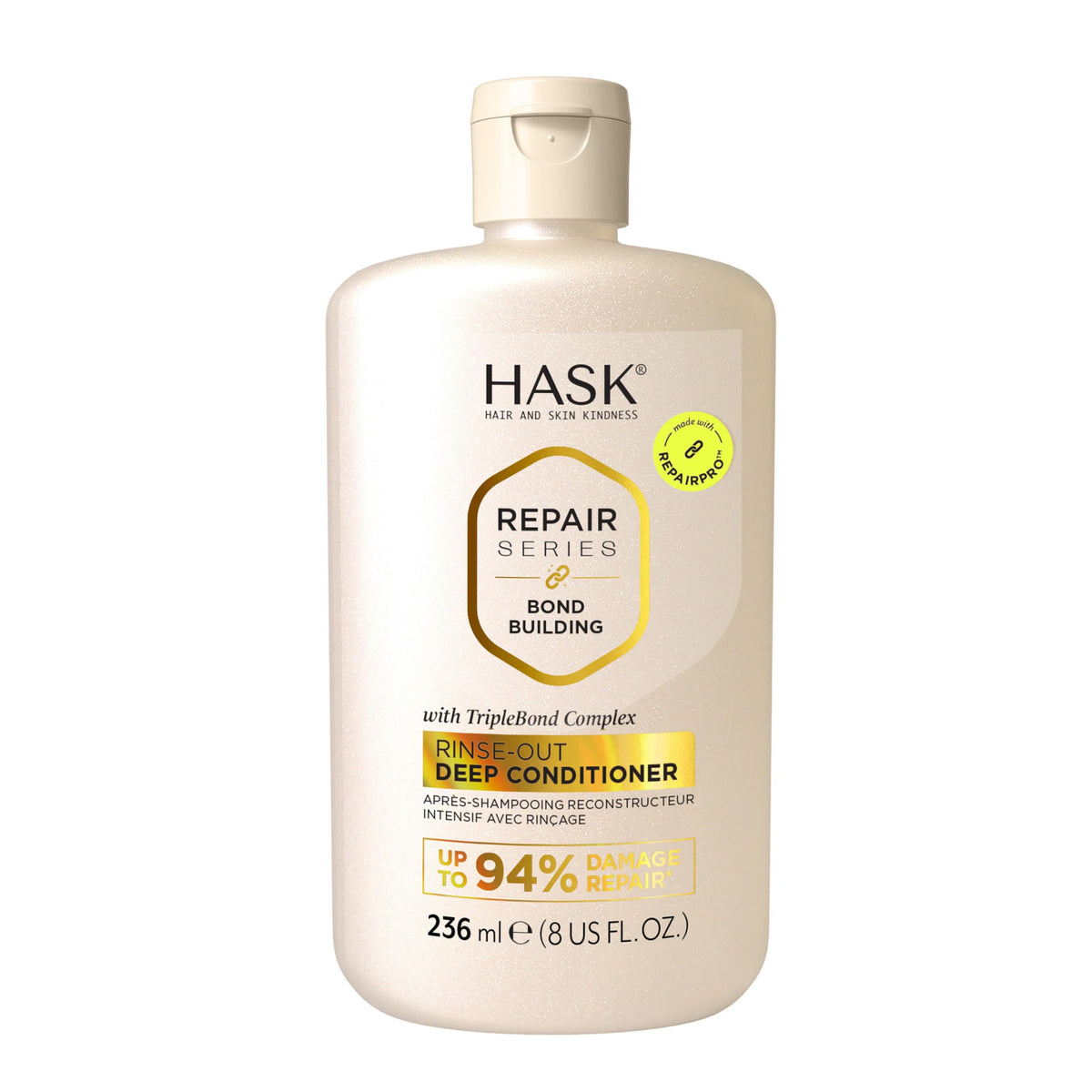 HASK bouteille visible montrant le soin de liaison pour cheveux forts et hydratés.