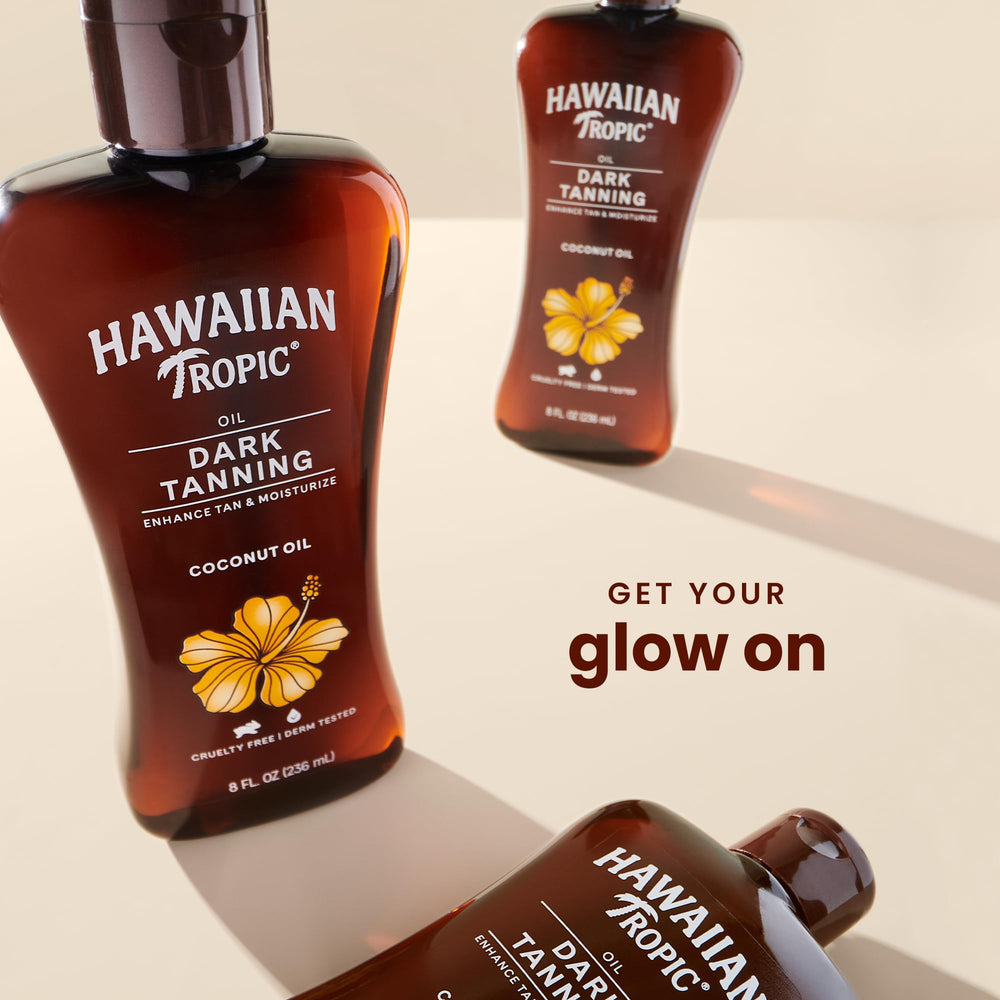 Application satinée de l’huile Hawaiian Tropic pour bronzage uniforme