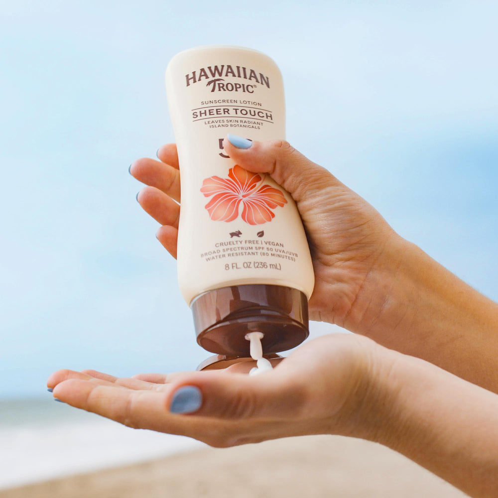 Ingrédients insulaires tels que papaye et aloe dans Hawaiian Tropic.