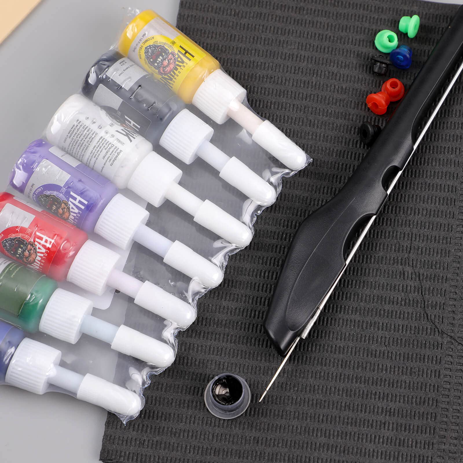 HAWINK encre tatouage 7 couleurs – palette variée pour essais créatifs.