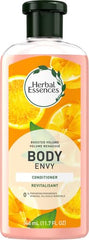Herbal Essences Body Envy montre l’application donnant du corps aux cheveux fins.