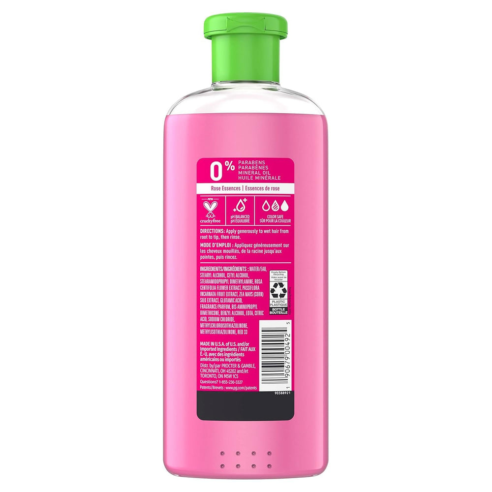 Herbal Essences Color Me Happy Après-Shampooing, texture soyeuse et parfum rose marocaine.