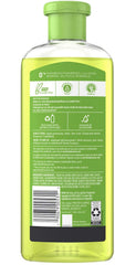 Herbal Essences Tea-Lightfully Clean : mains appliquant le shampooing pour un soin quotidien léger.