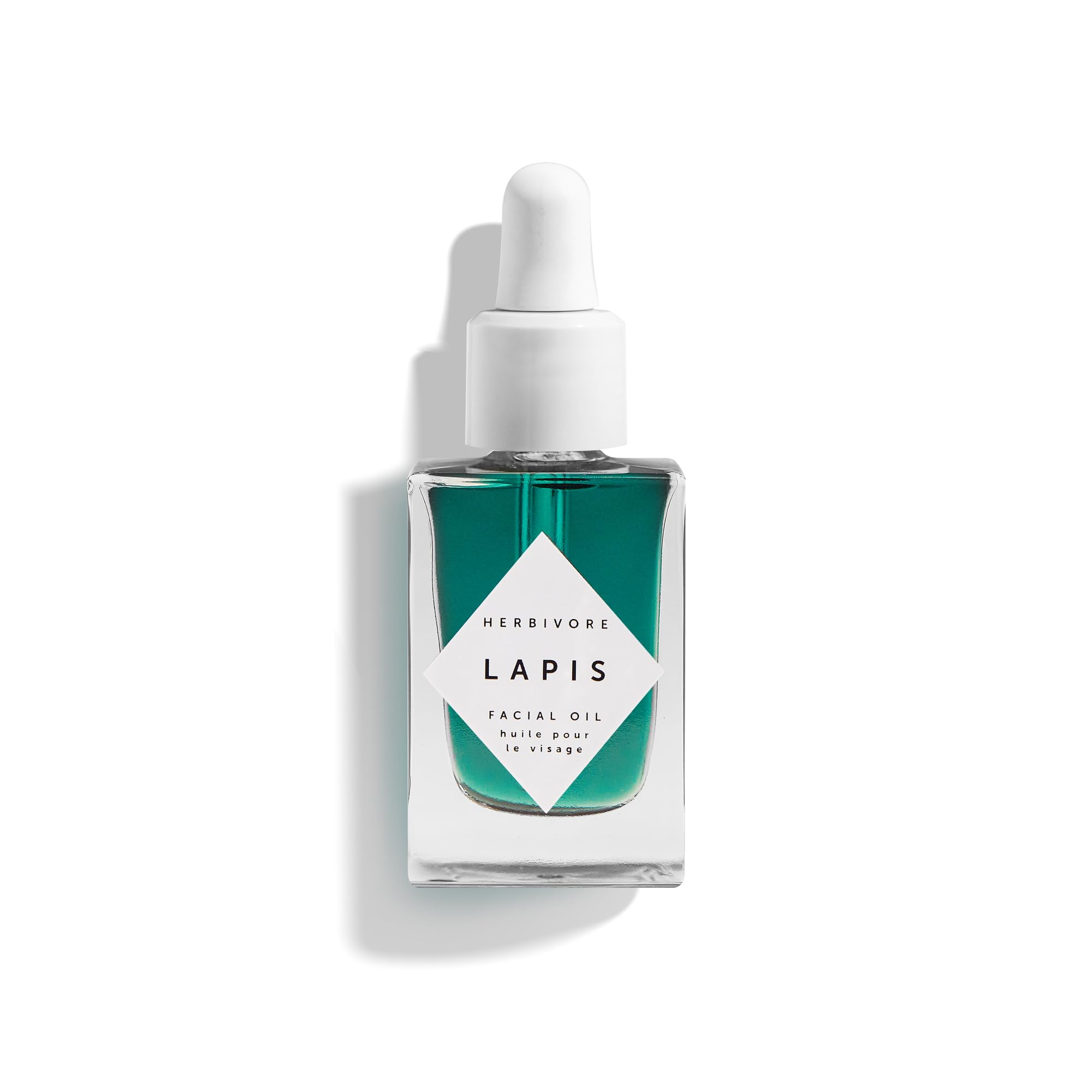 HERBIVORE Lapis Huile Visage: bouteille élégante favorisant équilibre cutané.