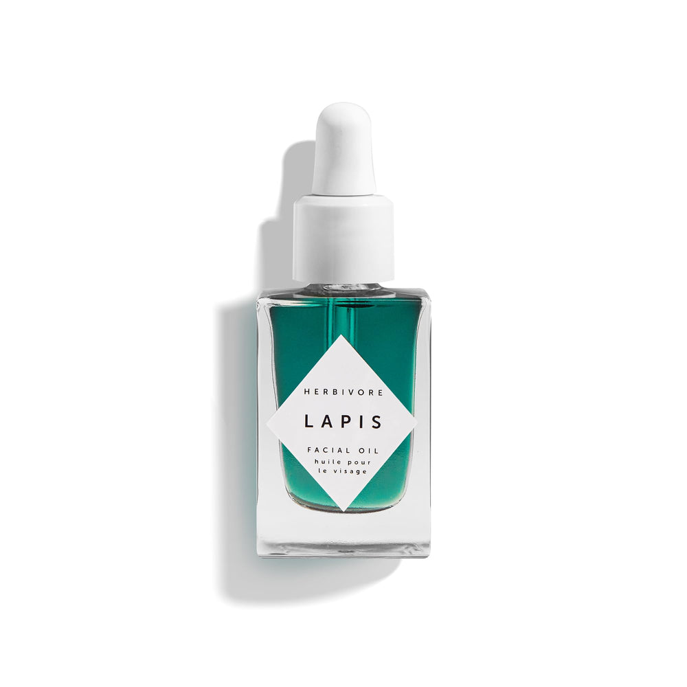 HERBIVORE Lapis Huile Visage: bouteille élégante favorisant équilibre cutané.