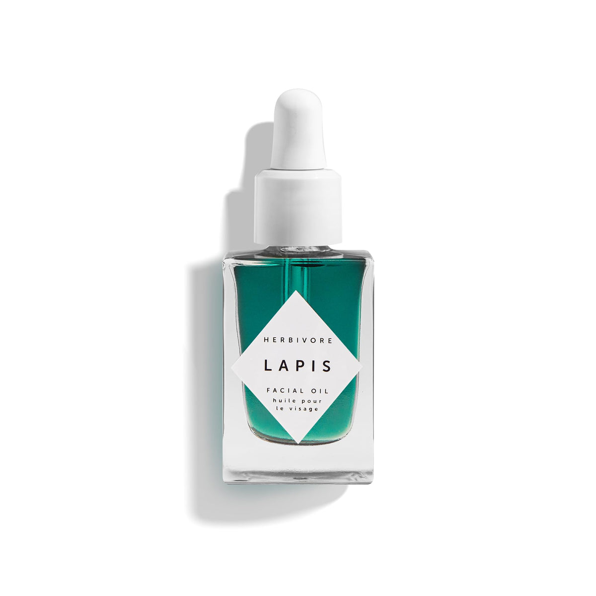 HERBIVORE Lapis Huile Visage: bouteille élégante favorisant équilibre cutané.