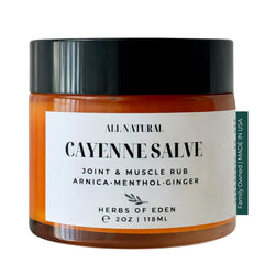 Herbs of Eden Baume Cayenne Arnica dans un bocal en verre, utilisation topique apaisante.