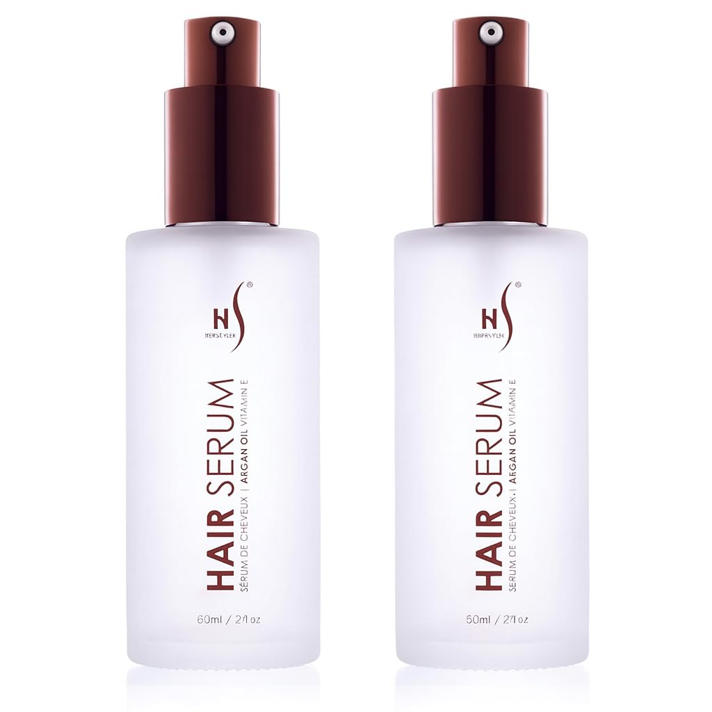 Herstyler Argan Oil Serum bottle glistens with natural shine for all hair types.