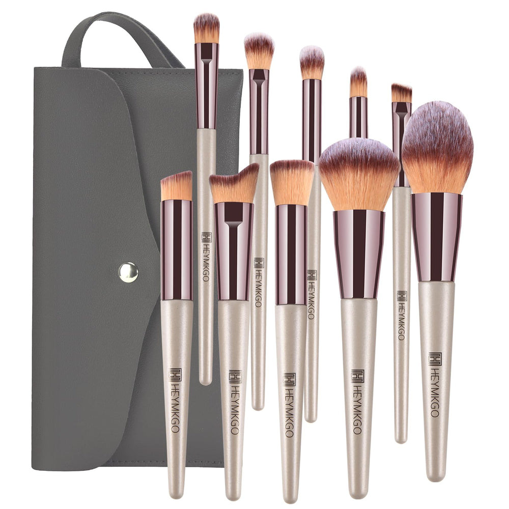 HEYMKGO ensemble pinceaux maquillage portable en or champagne, design chic et pratique pour n'importe où.