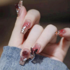 Ongles Hkanlre Bling Coffin rouges à paillettes pour un look glamour.