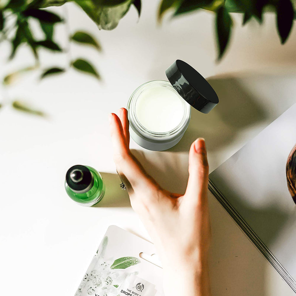 Pot Hoa Kinh 2 oz etanche, idéal pour cosmétiques et huiles.