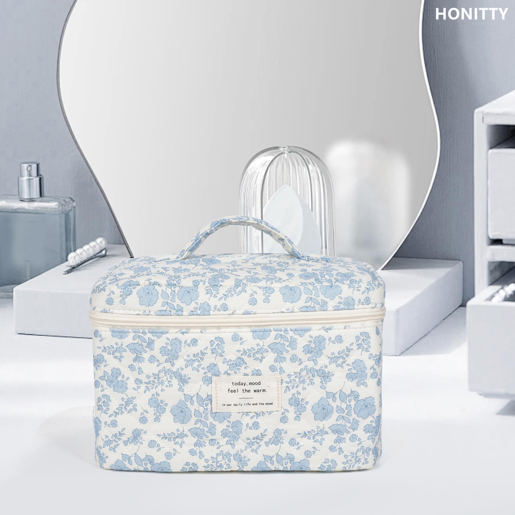 Honitty florale quilté, compacte et légère, idéale en voyage.