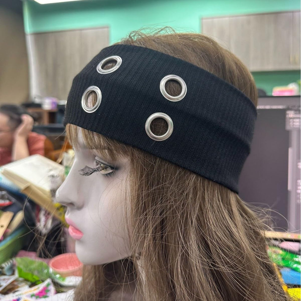 Edition extérieure: bandeau Hornedi noir idéal pour les sorties et le sport.