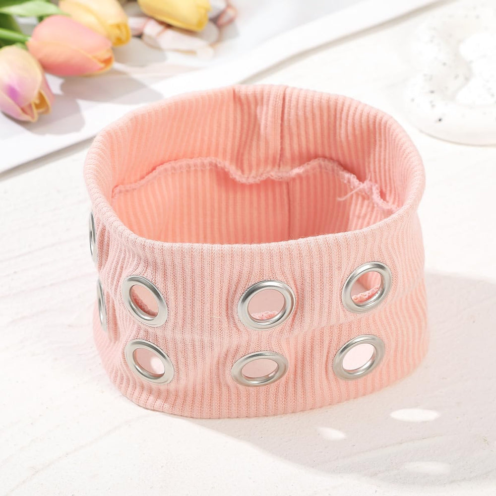 Bandeau Hornedi en maille avec elements metalliques, style tendance et polyvalent.